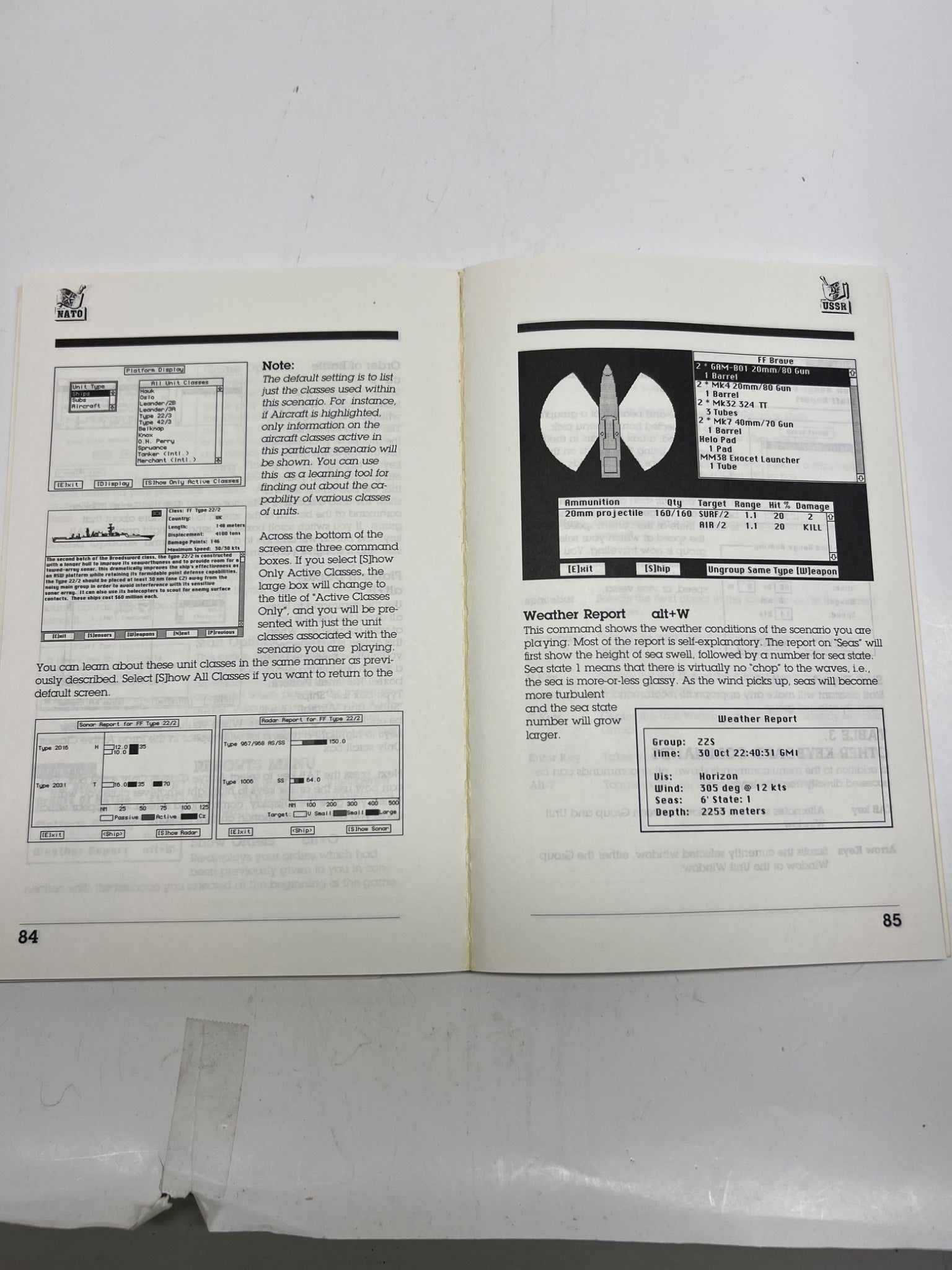 Open book with technical text and diagrams on a white background