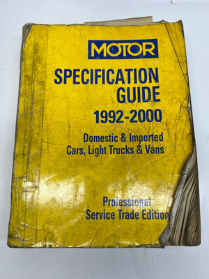 Yellow book titled 'Motor Specification Guide 1992-2000' on a white background