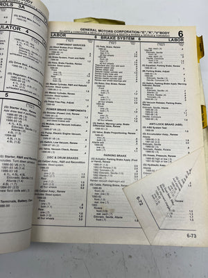 Open book with technical text and tables on a white background