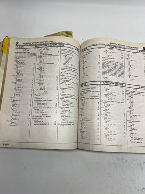 Open book with technical text on a white background