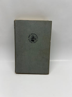 Vintage book with a visible logo on the cover against a white background